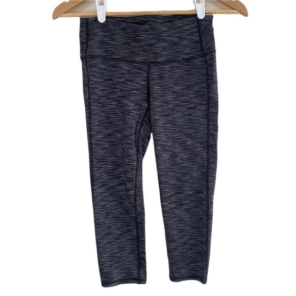 Athleta Pants - Athleta Chaturanga ultra cropped leggings black and gray striped Size XS